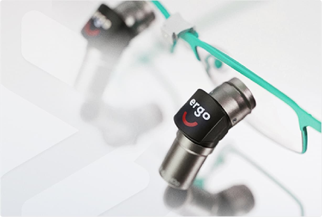 Dentist using ergonomic loupes in proper posture